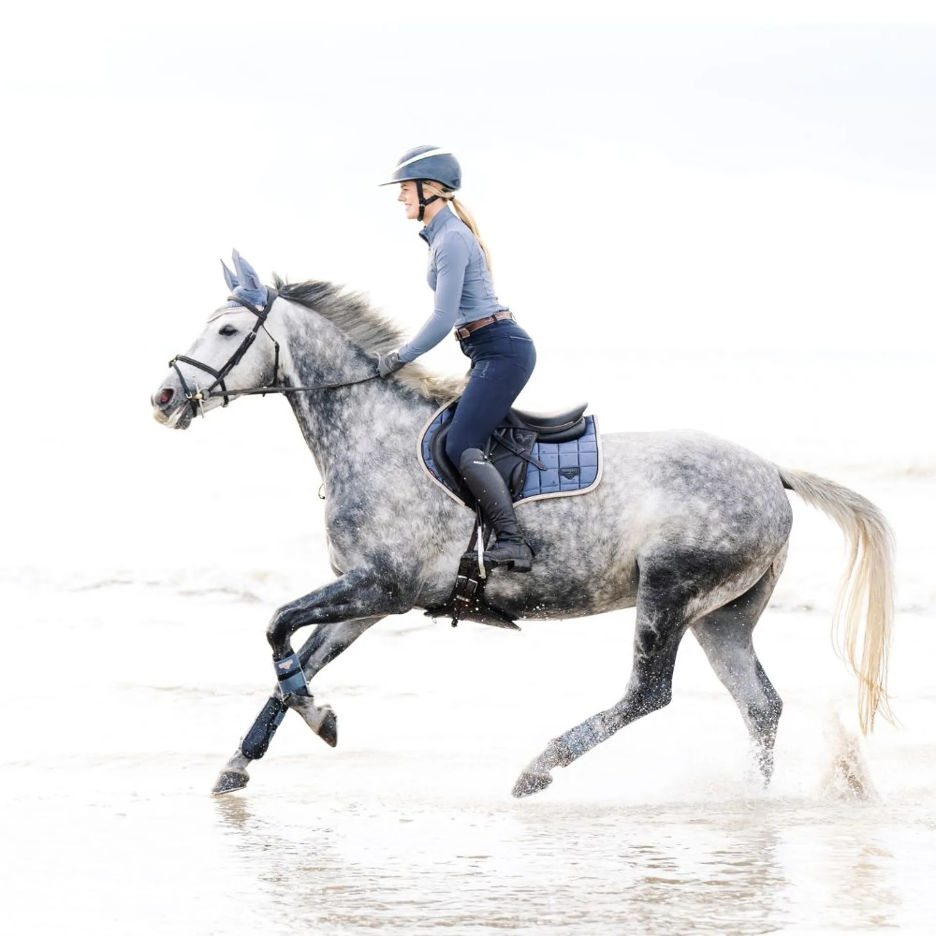 This Esme Riding on beach